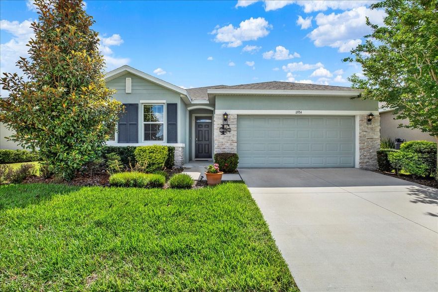 Tucked inside the gated community of Waterleaf, this 4-bedroom, 2-bath home delivers the kind of space, natural light, and a layout that truly works.....exactly what today's buyers are looking for. Built in 2020 and offering 2,046 square feet and a 2-car garage, the home combines open-concept living with thoughtful upgrades and a comfortable, move-in ready feel throughout.  The kitchen anchors the heart of the home with granite countertops, stainless steel appliances, gray cabinetry, a large center island, walk in pantry, and direct views into the main living and dining spaces — perfect for both entertaining and everyday life. Large windows and custom blinds help create a bright, welcoming atmosphere across the entire home. The spacious primary suite features dual vanities, dual closets, a walk-in shower, and a generously sized bathroom designed to feel both functional and relaxing. Three additional bedrooms with a split floor plan, provide flexibility for guests, family, or a home office setup.  Outside, the screened lanai extends the living space and overlooks a sizable backyard with plenty of room to unwind, entertain, or create your own outdoor oasis. With its stone-accented exterior, well-kept condition, inviting curb appeal, and location inside one of Riverview’s sought-after communities, this home offers the perfect blend of comfort, style, and everyday convenience.  This community has lower HOA fees!  Fees include lawn, internet and cable TV, beautiful community pool, walking trails, and large and small dog parks. Close to Shopping, Restaurants, Groceries, Banks and Hospitals.  Minutes from Interstate 75 for ease of access.  Book a private showing today!!!