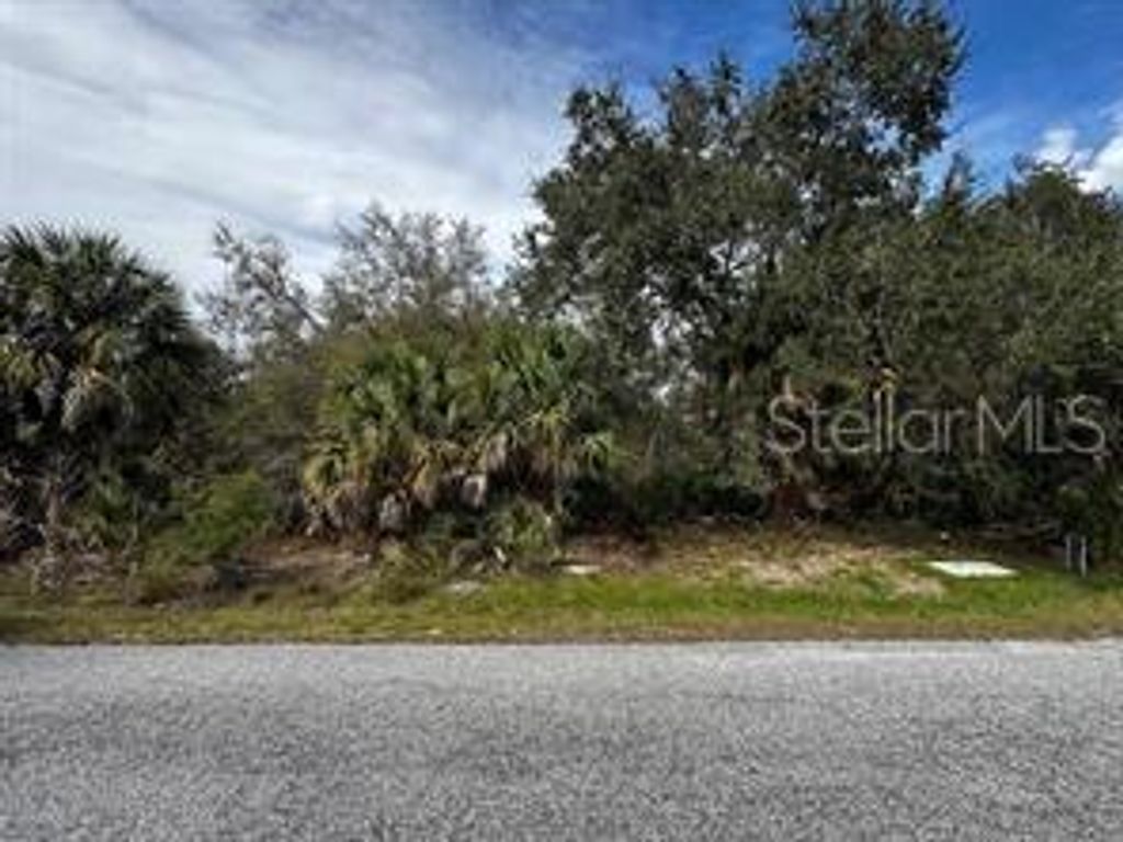 Photo of 17316 Poston Avenue, Port Charlotte, FL 33948 (MLS # O6384847)