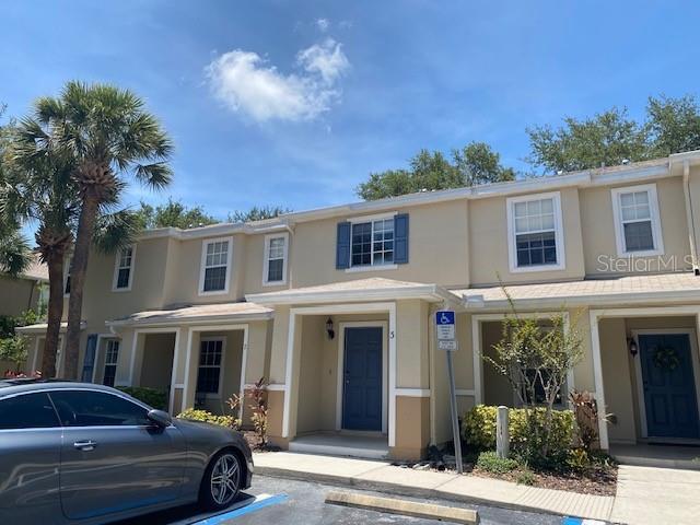 Location, location, location! Check out this two bedroom two and a half bath townhome centrally located just off US 19 and Harn Blvd. Fast and easy commutes north, south, east and west! Downstairs features open living spaces and wood laminate flooring, the kitchen is complete with all appliances, island and pantry. Family room features a full wall closet for storage space. Brand new carpet just installed on the second floor and features two bedrooms, two full baths plus laundry room including washer and dryer. Open patio outside of family room and assigned parking space. Rent includes trash service.