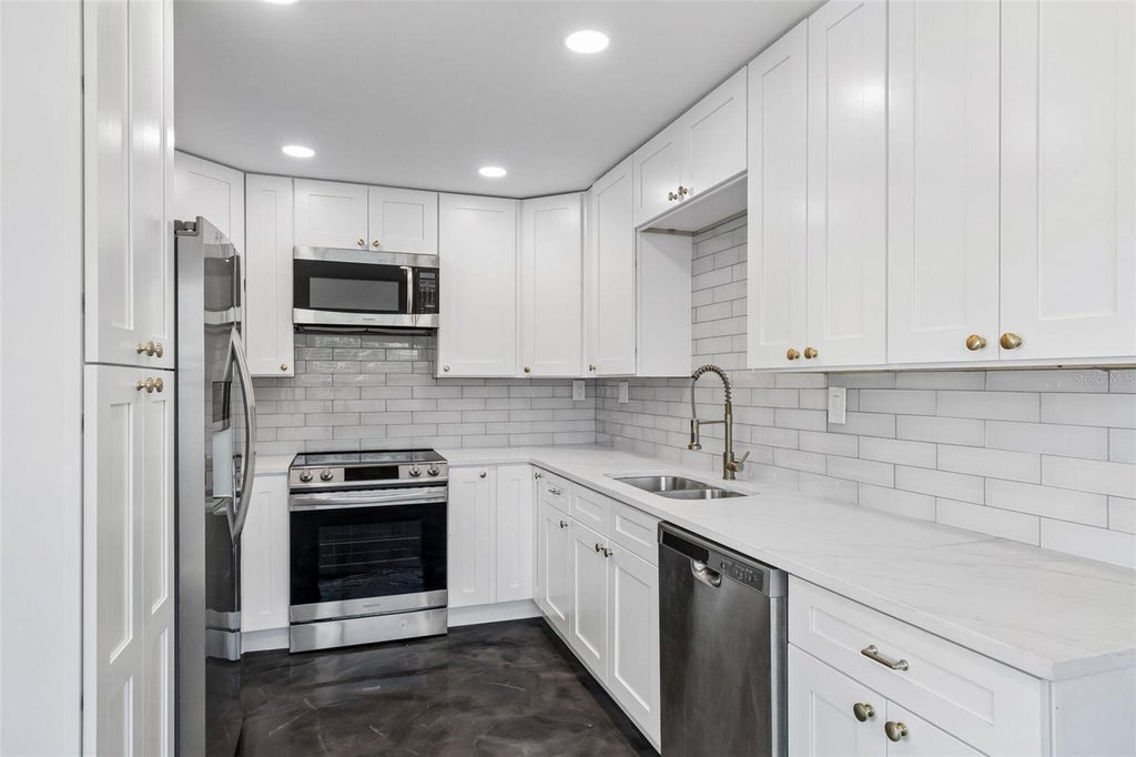 Photo of 4125 Grove St, St Petersburg, FL 33705 (MLS # O6423685)