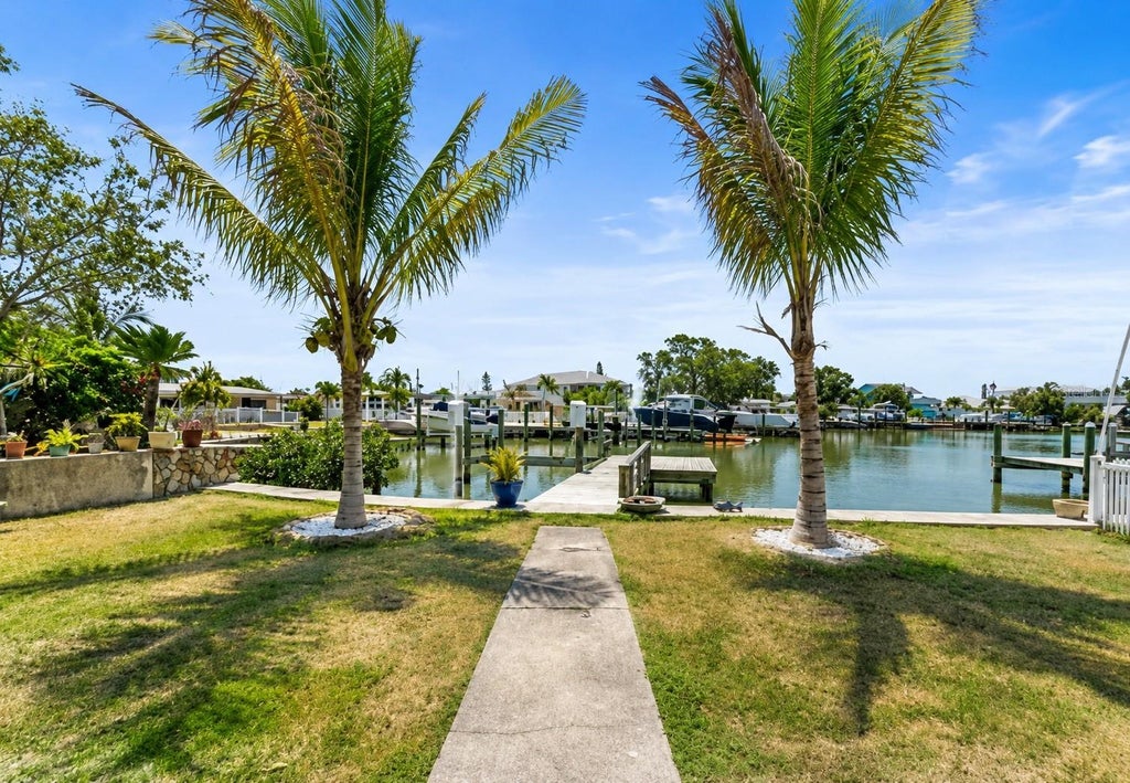 Photo of 14184 W Parsley Drive, Madeira Beach, FL 33708 (MLS # A4689603)