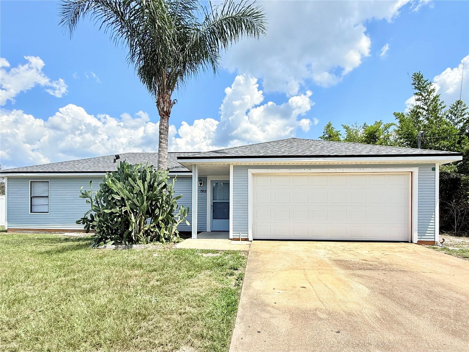 Welcome to this charming 3-bedroom, 2-bathroom home featuring a desirable split-bedroom floor plan and a spacious 2-car garage. Bright and open throughout, the home has been freshly painted and updated with brand-new flooring, giving it a modern and inviting feel. The large, fully fenced backyard offers plenty of space for outdoor living, gardening, or play. Features a brand new roof. With its move-in-ready updates and versatile layout, this home is a wonderful opportunity to create a place that’s truly your own.
