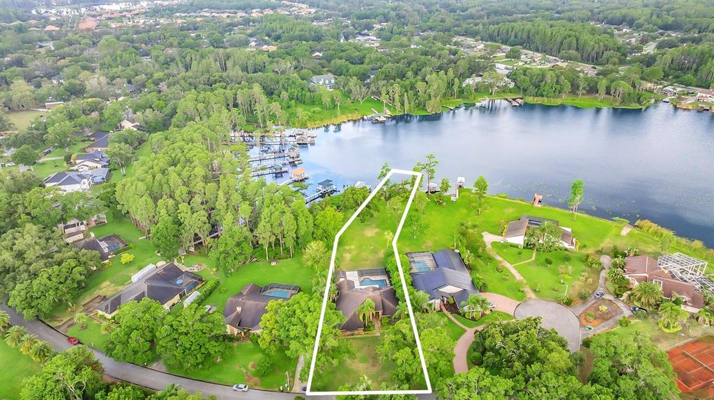 Photo of 707 Warren Road, Lutz, FL 33548 (MLS # TB8390316)