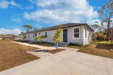 Photo of 246 Rotonda Boulevard, Rotonda West, FL 33947 (MLS # O6256121)