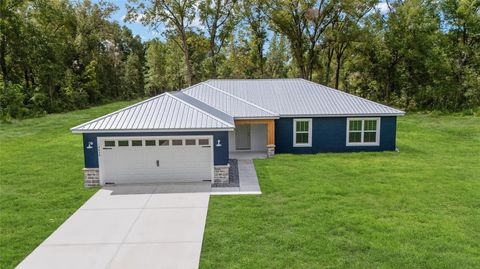 Photo of 12650 SW 94th Lane, Dunnellon, FL 34432 (MLS # OM708603) Photo of 12650 SW 94th Lane, Dunnellon, FL 34432 (MLS # OM708603)