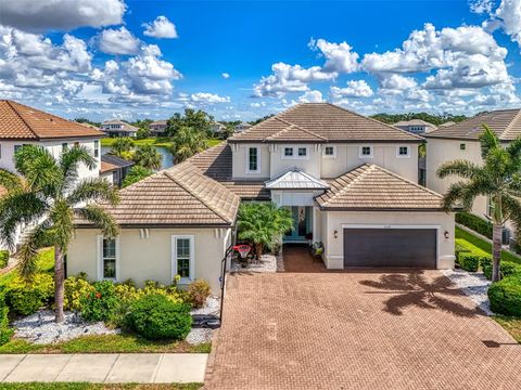 Photo of 6318 Rivo Lakes Boulevard, Sarasota, FL 34241 (MLS # A4656138)