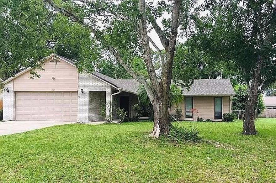 Welcome Home! This split floor plan features 3 bedrooms and 2 bathrooms, including a spacious family room and oversized 2 car garage. This house has tons of storage. The family room and dining room have vaulted ceilings. New appliances in the kitchen with a cozy breakfast bar. Split bedroom plan with master bedroom on one side with a large customized closet system and the remaining bedrooms on the other side. The bathrooms have all been updated and have ceramic tile and Pergo XTreme flooring throughout the entire house. Many other updates include a Roof in 2019, A/C unit, and brand new ductwork throughout in 2020. Enjoy your enclosed air-conditioned Florida room currently being used as a home gym. There is plenty of room in this large fenced in backyard for a pool, and it has a storage shed with power for your lawn equipment or a workshop. Property sold "AS IS." All information in the MLS is believed to be accurate but cannot be guaranteed. ;Water: City