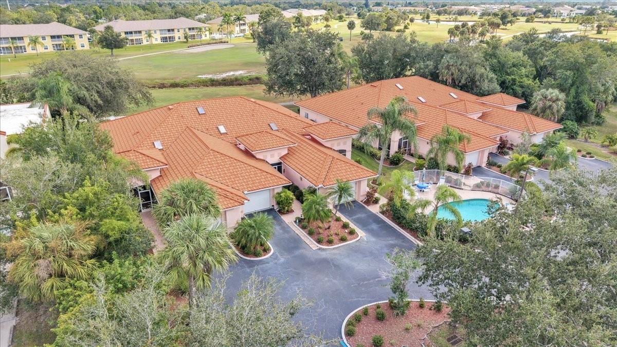 TURNKEY READY Villa with Golf Course Views in Rio Golf Villas!  This beautifully maintained 3-bedroom, 2-bathroom end unit offers stunning views of the Deep Creek Golf Course and is just steps from the heated community pool. Light, bright, and move-in ready, this home features  open-concept layout that flows effortlessly from room to room. The welcoming bricked paved walk way leads to a cozy screened front porch, and then upon entering, you’ll find the dining area to the left, which opens into a well-appointed kitchen which is thoughtfully designed for the home chef, offering an ideal layout and abundant cabinet space, a suite of stainless-steel appliances, granite counters, double pantry, and bar for casual dining or gathering with friends. The kitchen flows into the spacious great room, where sliding glass doors lead out to the newly screened lanai—the perfect spot to relax and enjoy peaceful golf course views.  The primary suite includes a large walk-in closet and private en-suite bath with garden soaking tub, dual vanities, and stall shower. Two additional guest bedrooms are spacious with built-in closets and share a full bath are situated separately to provide privacy for you and your guests. A laundry room with washer and dryer adds everyday convenience. Additional highlights include a new A/C (2020), water heater (2010), impact windows, irrigation system, decorator light and fan fixtures, and attached garage with extra storage space. Rio Golf Villas is an intimate community of just six residences, making decision-making simple and fostering a true sense of camaraderie among owners. Located just down the street from the Deep Creek Golf Clubhouse, where you can set your tee times or enjoy a casual meal, this villa also offers quick access to shopping, dining, pristine beaches, and historic downtown Punta Gorda. **PLEASE ENJOY THE 3D INTERACTIVE VIRTUAL TOUR ASSOCIATED WITH THIS LISTING**