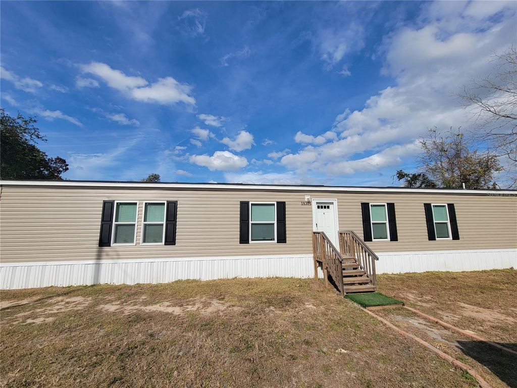 Photo of 18303 SE 20th Place, Silver Springs, FL 34488 (MLS # OM715784)