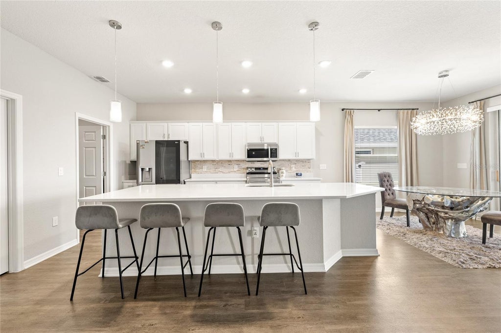 Photo of 1223 Mountain Flower Lane, Davenport, FL 33837 (MLS # O6440034)