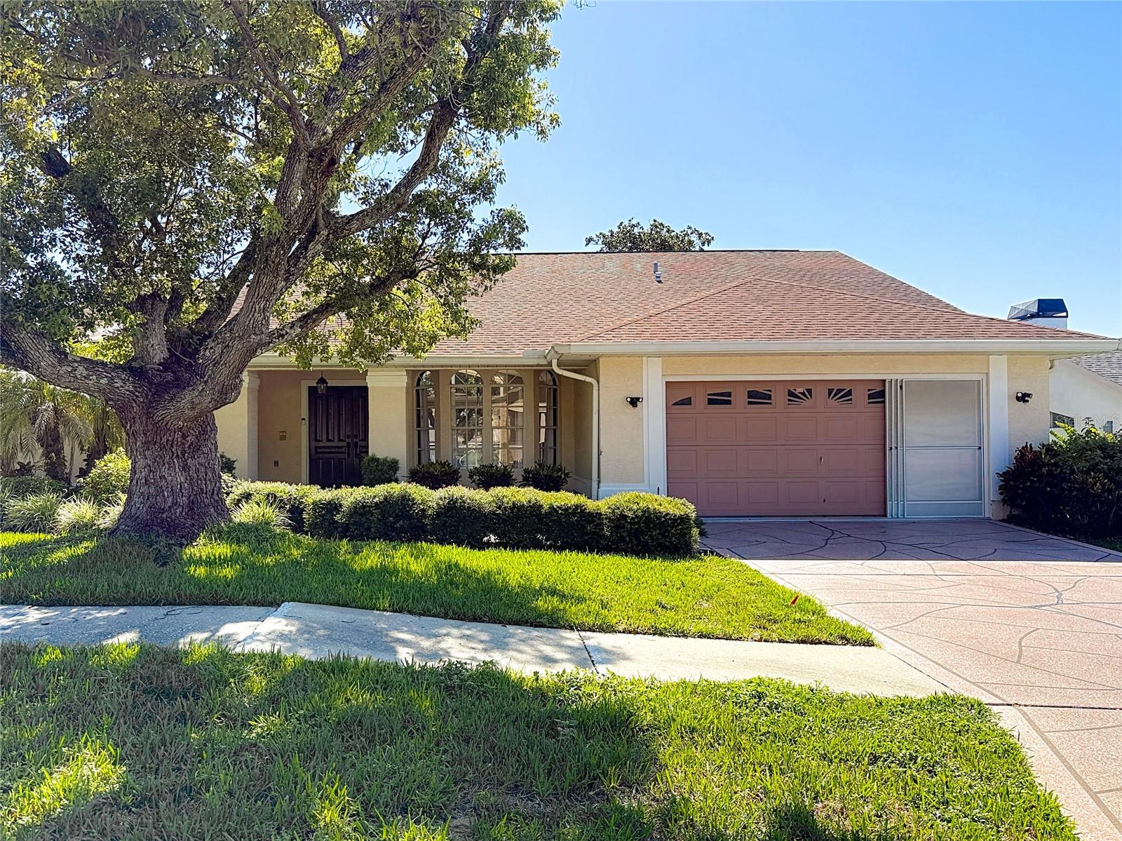 One or more photo(s) has been virtually staged. More Photos Coming!!! Welcome to your very own slice of paradise in the inviting Seven Hills neighborhood of Spring Hill, FL! This beautifully updated 3-bedroom, 2-bathroom residence is designed for comfortable living and effortless entertaining, making it the perfect sanctuary for those seeking a tranquil Florida lifestyle. With a gorgeous pool and a thoughtful split floor plan, this home is sure to meet all your needs and exceeds your expectations.
As you step inside, you'll immediately appreciate the brand-new luxury vinyl flooring that adds both elegance and durability throughout the living spaces. The modern, updated kitchen features new cabinets adorned with stylish gold hardware, sleek countertops, a convenient breakfast bar, and newer stainless steel appliances, making it a chef's delight. Whether hosting gatherings or enjoying a quiet meal at home, this kitchen is sure to impress.
Step outside to your private oasis featuring a sparkling pool, perfect for cooling off on warm Florida days or entertaining guests. With sliders that pocket back off both the master bedroom, living room, and kitchen, the seamless transition to the outdoor space invites you to enjoy al fresco dining and relaxing by the pool. The spacious outdoor area provides plenty of room for lounging and soaking up the sun, surrounded by lush landscaping that enhances your privacy.
The home includes three comfortable bedrooms, offering ample space for rest and relaxation, along with two updated bathrooms designed with modern finishes for your convenience and comfort.
Nestled in the friendly Seven Hills community, you'll benefit from a strong sense of belonging and numerous nearby amenities, including parks, picturesque walking trails, and local golf courses. Enjoy the convenience of being just minutes away from shopping, dining, and healthcare facilities, with Brooksville Regional Hospital and Spring Hill Regional Hospital both nearby. The stunning Pine Island Park, the nearest beach, is only about **10 miles** away, making it easy to enjoy sun-soaked days by the water.
With its affordability, safety, and charm, this property represents a wonderful opportunity to embrace the Florida lifestyle.
Don’t miss your chance to make this stunning home your own!
