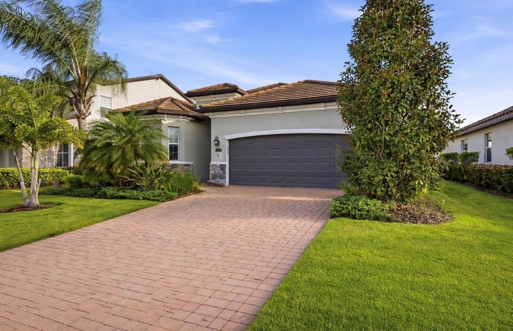 Photo of 12241 Perennial Place, Lakewood Ranch, FL 34211 (MLS # TB8495271)