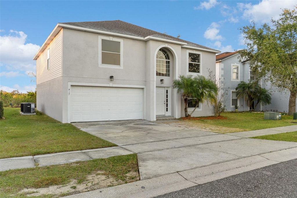 Photo of 917 Kenbar Avenue, Haines City, FL 33844 (MLS # P4937613)