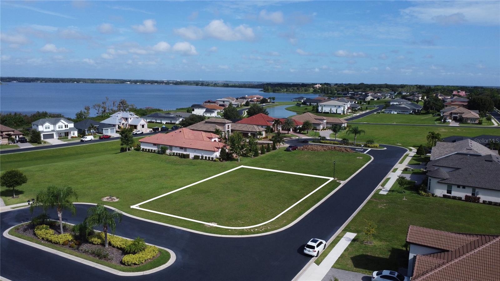 Discover the perfect place to build your dream home on this vacant, leveled lot—ready for immediate construction. Nestled on a quiet dead-end street in a cul-de-sac, this homesite offers extra privacy within a secure gated community. Start living the resort-style life every day with access to endless amenities, including a sparkling community pool, lighted tennis and pickleball courts, basketball courts, a state-of-the-art fitness center with sauna, fishing pier, and even a community boat ramp for water sport enthusiasts. Golf cart friendly and conveniently located just 35 minutes from Disney, this property combines relaxation, recreation, and unbeatable location all in one.Mo timeframe to start the construction and you can bring your own builder.