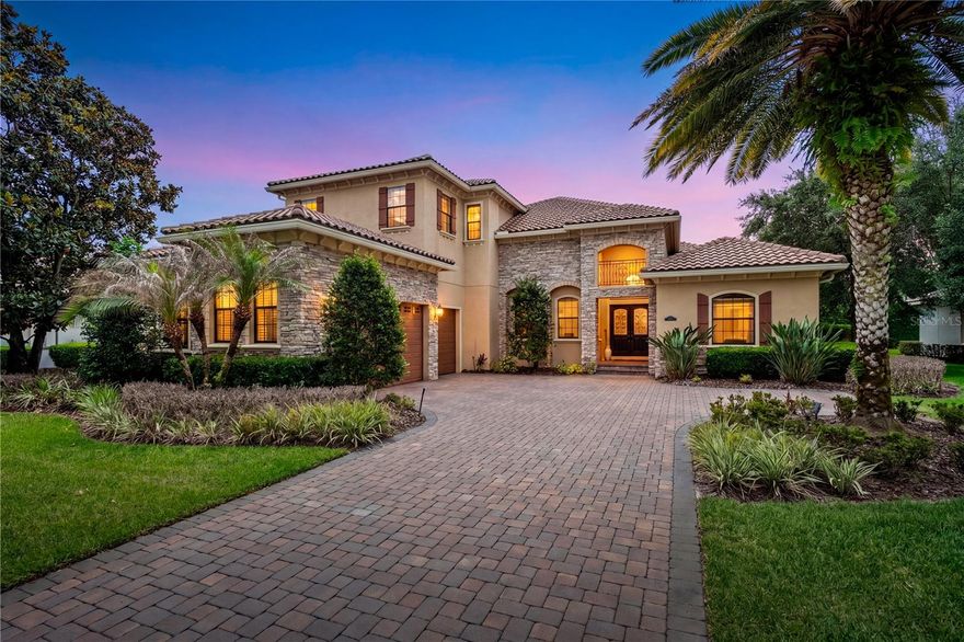 Tucked away in “The Gardens” of the desirable guard gated golf course and lakefront community of Keene’s Pointe, this beautifully maintained 4-bedroom, 4.5-bath residence offers 4,037 square feet of thoughtfully designed living space on nearly a half-acre pond front homesite. Lovingly used only as a vacation home by its current original owners, the property presents in exceptional, like-new condition—showcasing pristine finishes, high-end appliances, and 12 to 14 ft ceiling heights throughout this estate home.
This versatile floor plan features the primary retreat on the main floor along with two oversized secondary bedrooms that share a deluxe full bathroom and a spacious 4th Bedroom with a full bath located just steps from the pool.   The floor plan’s flexibility is further enhanced by a second floor bonus room that would make a fabulous 5th Bedroom or office to include a sitting area, large full bathroom and walk in closet.    
Enter through elegant double doors into an inviting great room that seamlessly connects to a well-appointed kitchen and breakfast nook with pool views and an open concept living area - perfect for both everyday living and entertaining. Step outside to a covered paver patio overlooking a private backyard oasis featuring a deluxe summer kitchen with natural gas grill and wet bar as well as a saltwater pool, heated spa, and fully fenced yard.  Enjoy tranquil pond views complete with a lighted fountain, stunning sunset vistas, and even Disney fireworks in the distance. Additional highlights include a three-car garage and paver driveway, enhancing both curb appeal and functionality.
Built in 2012, this is one of the newer homes in Keene’s Pointe offering modern construction, double pane windows, timeless design, and an unbeatable setting.