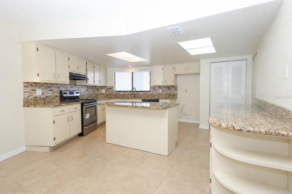 Photo of 1054 Lotus Cove Court #614, Altamonte Springs, FL 32714 (MLS # O6443133)