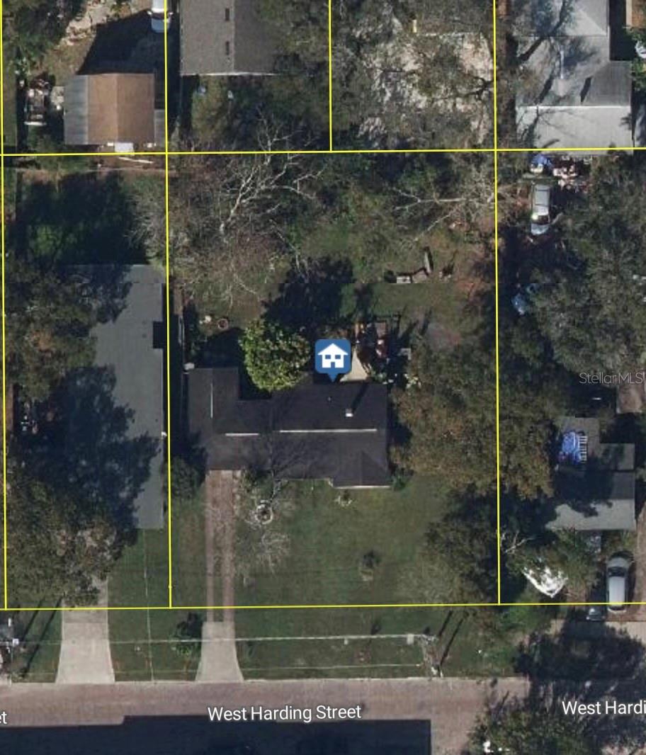 Builders here is your opportunity to purchase a amazing site in RED Hot SoDo! There is the potential to build income producing properties on this double lot in an incredibly convenient location that is close to everything, including shopping, entertainment, hospitals and highways with many places you can bike or walk to explore. Value is in the land. Buyer to verify all measurements, restrictions, lot splitting, zoning rules, etc. Buyer has to confirm use of lots and zoning rules, there is a POSSIBILITY of building 4 townhouses or splitting to two buildable single family lots. The seller and realtor make no guarantees. Buyer to check with government entities to find what may be the acceptable use of the property.
