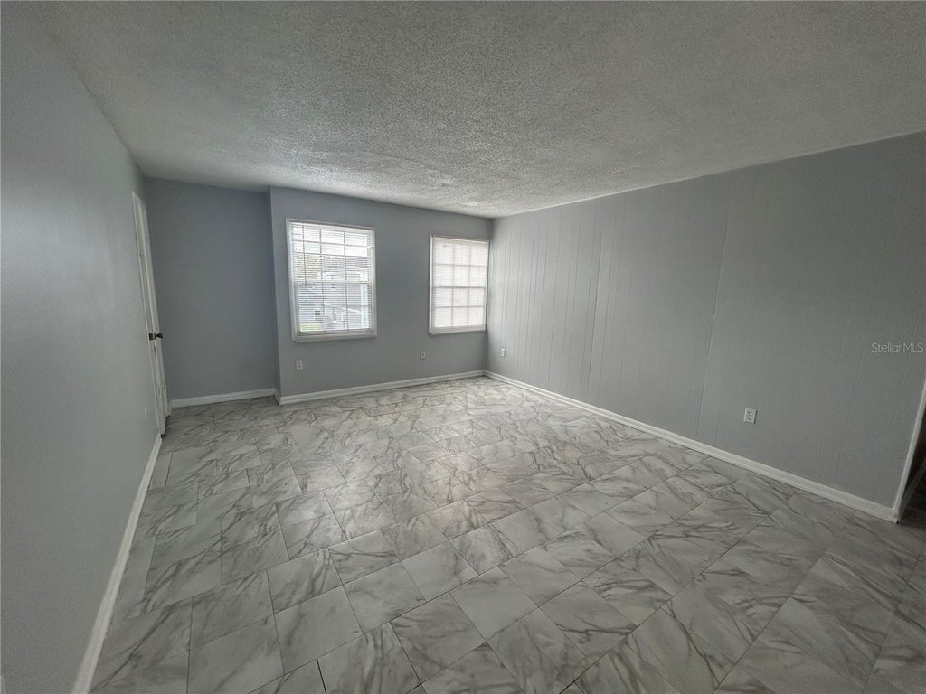 Photo of 2755 L B Mcleod Road #2755C, Orlando, FL 32805 (MLS # O6443410)