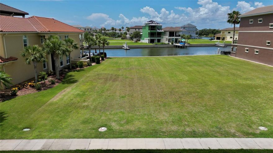 Owner Financing Available. Build your Florida waterfront dream home on this Premier deep salt water lot in Yacht Harbor Village with excellent views of the Atlantic Intracoastal Waterway. Very private lot w/ a 20 acre preserve across the street. A boaters paradise w/ a boat in your own backyard. Flood Zone "X" (flood insurance not required). Located ONLY 6 lots to the ICW & less than 1 mile to beach! Ocean access for the boat is a short 9 miles north to Matanzas Inlet. Land is cleared, flat and ready to build. The custom homes in this community are second-to-none. We have access to some amazing floorplans to consider your new build. 40' of rear water frontage to add your private boat dock or if you have a larger boat you can dock it at the private marina in the community. The sunset views are amazing from this lot with tons of wildlife including dolphins, abundant varieties of fish and birds. Owners have the option of joining the Hammock Beach Golf & Resort, only 1 mile away from lot, which also includes access to the Conservatory Golf Club & Yacht Harbor Village Club. 10 pools, private beach access, 2 championship golf courses (1 oceanfront), a world class spa, state-of-the-art fitness center, fantasy pool complex with a lazy river, waterslide, tennis courts, mini golf, 8 different restaurants and so much more.