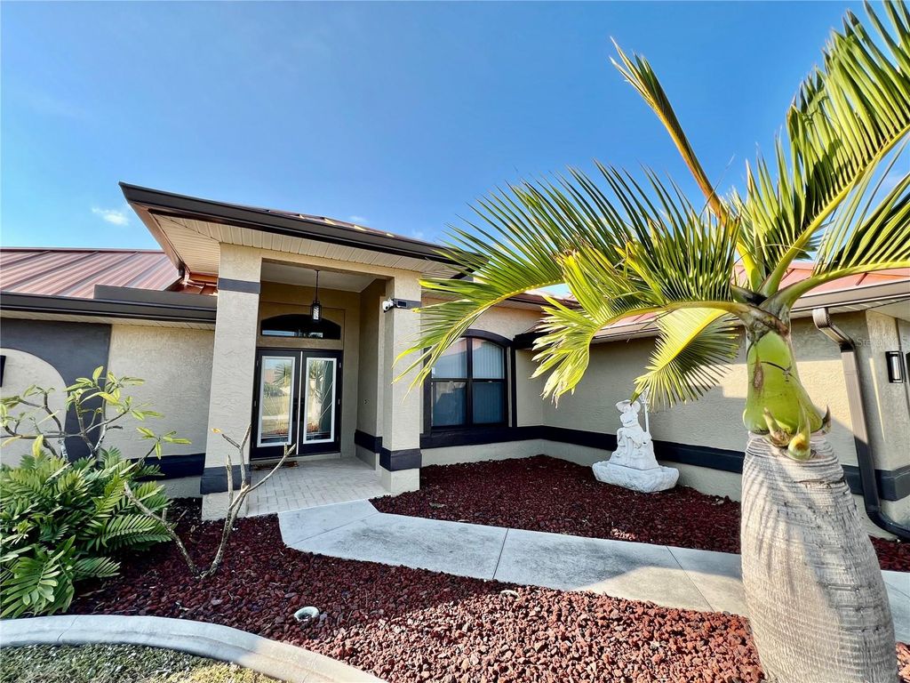 Photo of 426 NW 37th Place, Cape Coral, FL 33993 (MLS # C7516607)