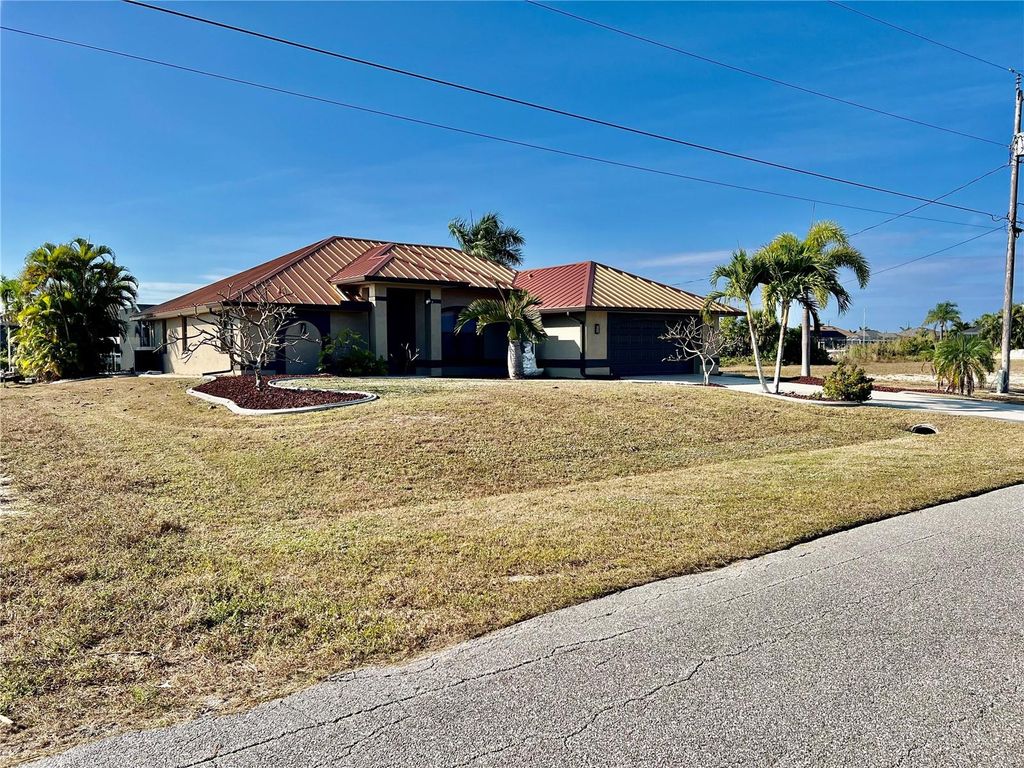 Photo of 426 NW 37th Place, Cape Coral, FL 33993 (MLS # C7516607)
