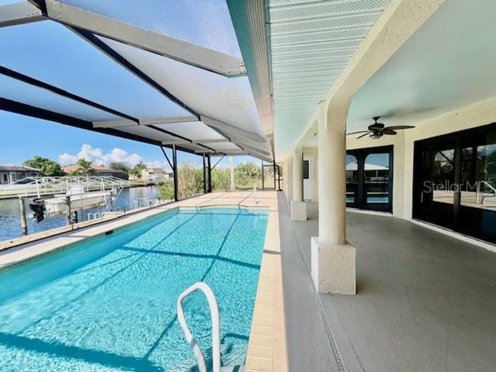 Photo of 426 NW 37th Place, Cape Coral, FL 33993 (MLS # C7516607)