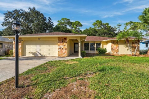 Photo of 5561 Briar Creek Way, Sarasota, FL 34235 (MLS # A4710525)