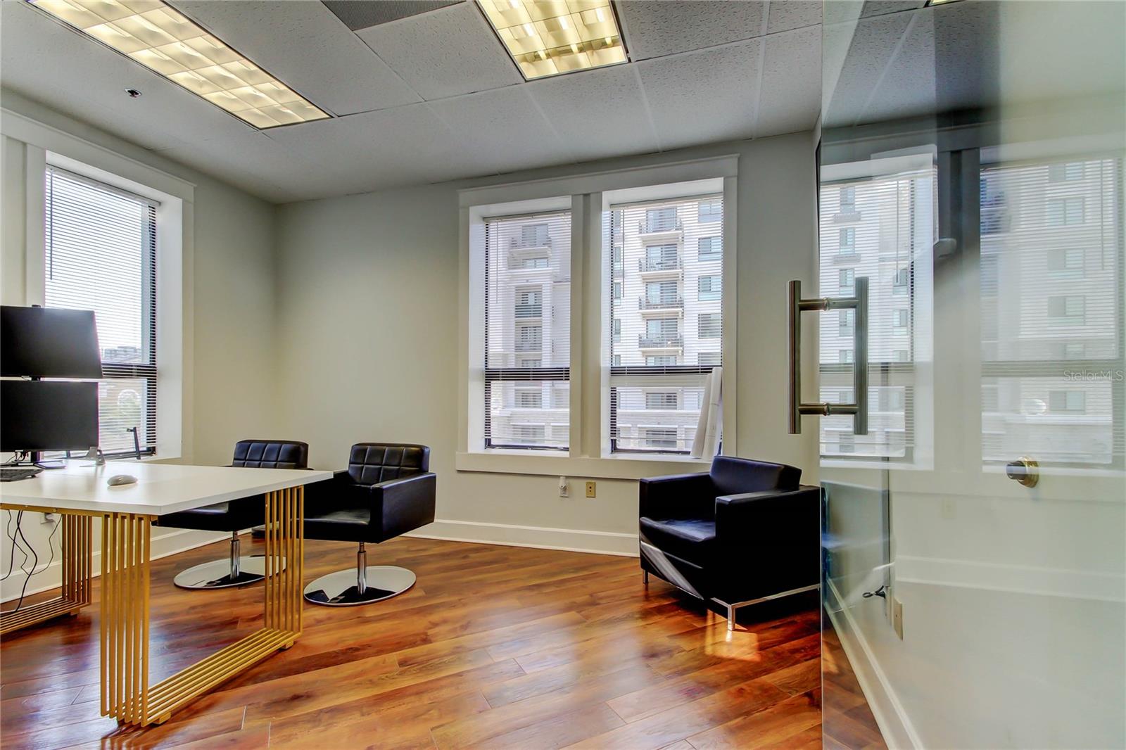 Sub-lease or assumption of existing lease. Welcome to Grand Central Place, located on the corner of West Kennedy Boulevard and South Hyde Park Avenue. This space provides two executive private offices, one with a private entrance, as well as a large reception/conference area. This fully furnished suite is available immediately and includes two assigned parking spaces in the parking garage. Come see your new office in to experience an ideal combination of the Hyde Park Charm and the Downtown hustle.