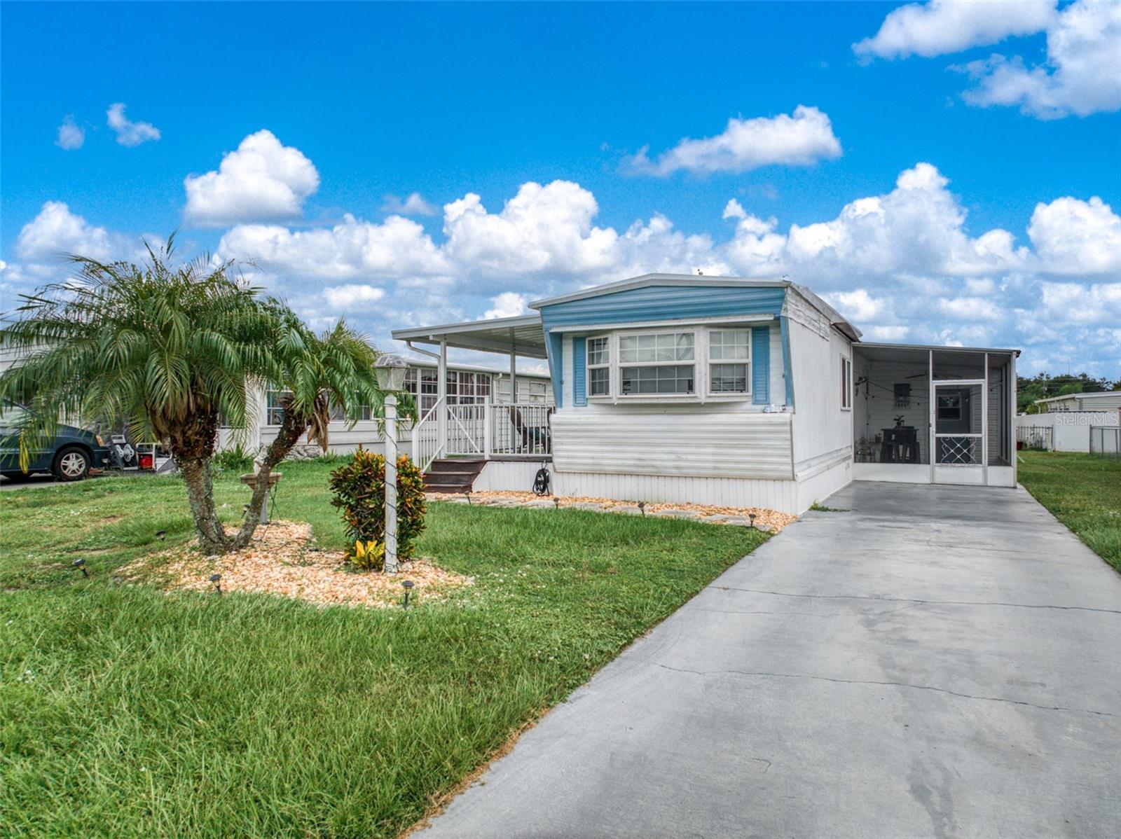 Spacious and Affordable Home in Fairmount Mobile Estates – No Lot Rent or HOA! Located in the quiet Fairmount Mobile
Estates community, this single-wide home offers comfort, convenience, and value. With no lot rent, HOA fees, or age
restrictions, you’ll enjoy the freedom of land ownership and the flexibility to make this home truly yours. Step outside to a
large 08x16 deck with a new aluminum cover and railing, perfect for outdoor dining or relaxing evenings. A new carport,
updated skirting, and shutters enhance the curb appeal, giving the home the feel of a double-wide. Inside, the open living
and dining area flows into the kitchen, creating a cozy space for everyday living or entertaining guests. The kitchen comes
equipped with nearly new appliances, including refrigerator, stove, and dishwasher, all less than two years old. The major
updates have already been taken care of, so you can move right in with peace of mind: new flooring throughout, a roof
under five years old, plus a new electrical panel and water heater. This property is being sold as-is, though inspections are
welcome. Don’t miss the chance to own your land and enjoy affordable living in a peaceful neighborhood, just minutes
from shopping, banking, and US-27. Schedule your showing today!