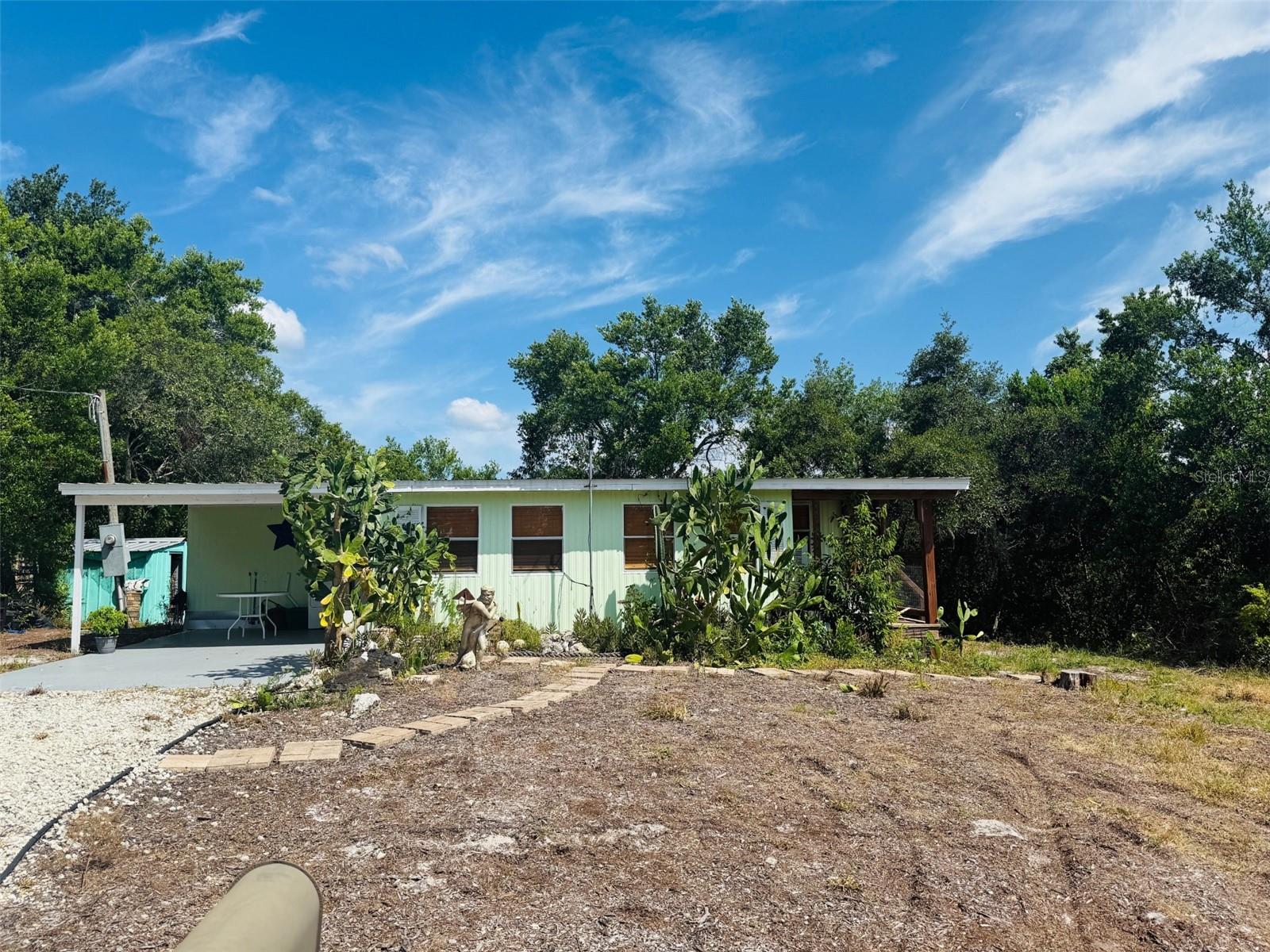 Welcome to this charming manufactured HOME near the Gulf in Weeki Wachee! A perfect getaway in this cozy 2-bedroom, 1-bathroom home, just a few miles from the Gulf of Mexico. Nestled in a serene neighborhood, this property offers proximity to coastal living without the high price tag. sold AS IS CASH ONLY ! This Community offers Private Access to the Weeki Wachee Main River AND a Park !! Bring your Kayaks, Water Toys and the family to enjoy this MEMBER ONLY ACCESS to the Weeki Wachee private park go Swimming/Snorkeling with the Manatees and Turtles along with picnics in the Pavilion