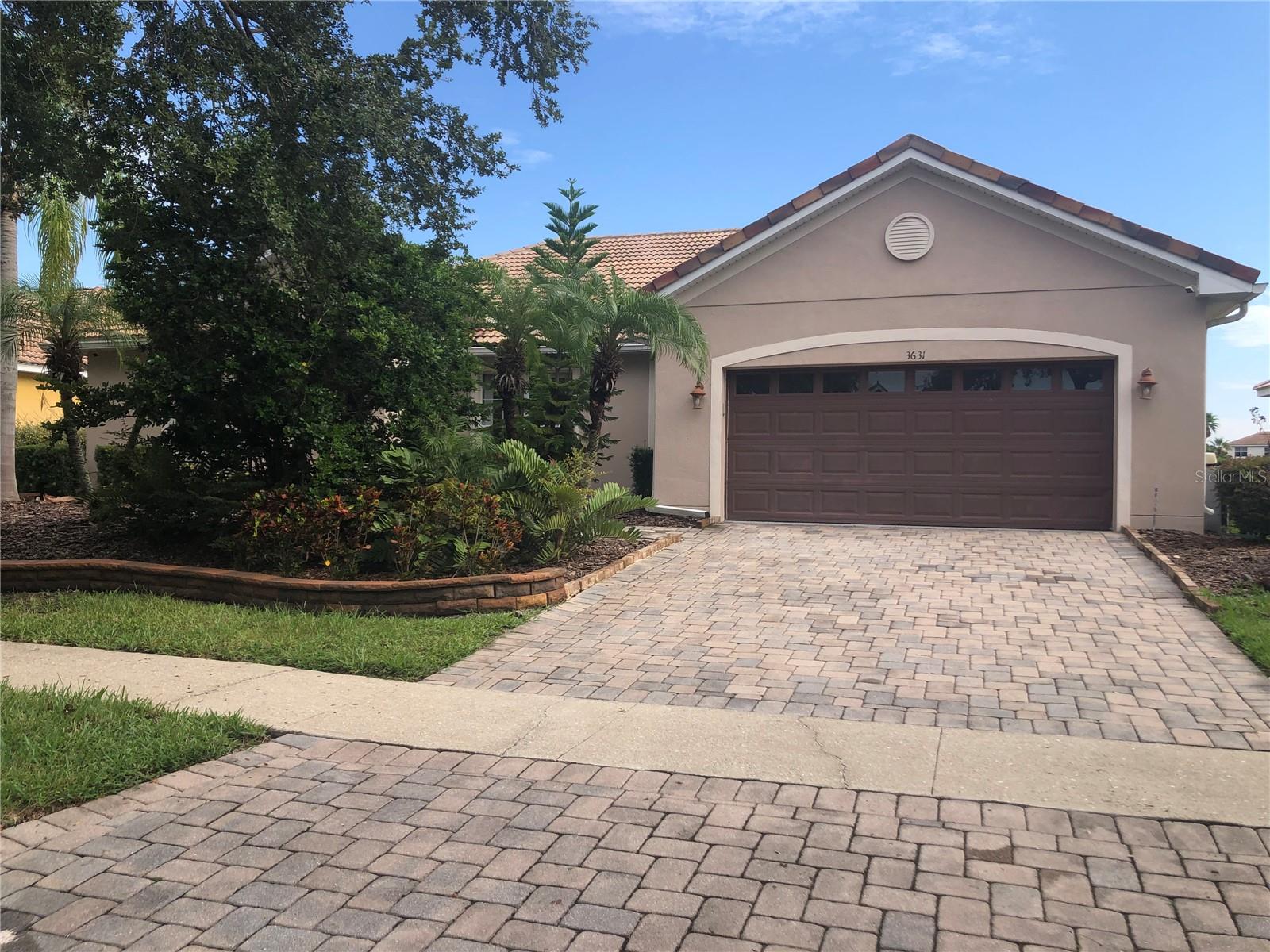 Beautiful pond view house without carpet located at the exclusive gated community of Bellalago in Kissimmee, Florida on more than a mile of shoreline along Lake Tohopekaliga. It is one story home, 3 bedrooms, with 1 office, living room, Flex room and breakfast dinette, 2 baths with 2 car garages. The master bathroom has tub and shower room, walk-in closets. Trail ceiling, the shared bathroom has two sinks. The free flow design of the kitchen with service counter, overlooks the casual room and falls into the great room making this an extremely functional space. 3 doors LG refrigerator and stone countertops in the kitchen. LG front load washer and dryer. The community features 3 pools, club house , tennis courts and basketball courts, access to Lake Toho for your own boat and so on.