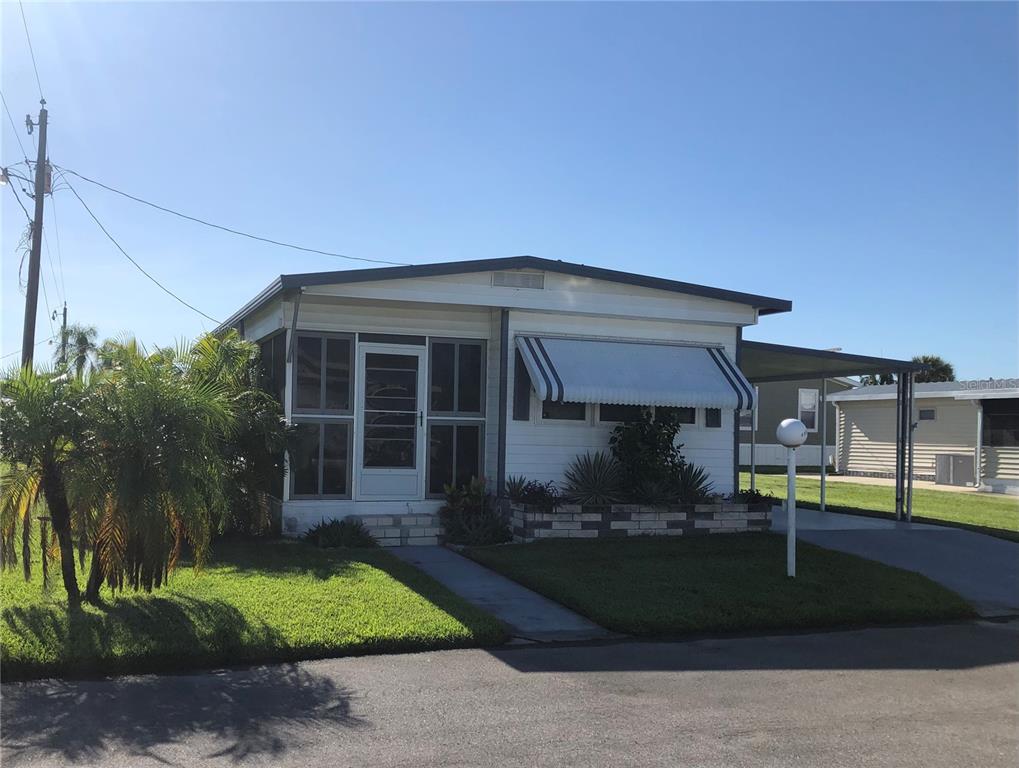 Now renting for the 2025 winter season Vacation in amenity filled Golf Lakes with a 3 month minimum! This gated, 55+ community has it all! Beautiful 40' x 60' heated pool, Jacuzzi spa, Par 3 9 hole golf course, state of the art fitness center, 24 lighted covered shuffleboard courts, 2 pickleball courts, 2 regulation horseshoe pits, lawn bowling field, basketball hoop, fishing with 4 different lakes not to mention activities daily! The main meeting area is the clubhouse which has a large area for parties and meetings, full kitchen, library, card rooms, billiard room and a craft room where you can enjoy ceramics, quilting and painting. There are many groups and clubs hosting activities each week. This fully furnished, turn key 2 bedroom, 2 bathroom home features a very nice, updated kitchen, comfortable living room with 44" TV, master bedroom with queen size bed and 36" TV. Second bedroom has a trundle bed which is set up as 2 twins. The first bathroom has a shower/tub combination and the second bathroom has a walk in shower. There is a screened lanai surrounded by lush landscaping. Perfect for enjoying your morning coffee or afternoon beverages! For your convenience there is a washer dryer in the storage room in the carport. The carport has room for one car under roof and a second car in the driveway. The association requires one occupant be 55 years or older and any other occupants must be at least 45 years old. The association requires a $100 per application. Spouses count as one application. There is a $350 exit cleaning fee. Any lease less than 6 months and 1 day are subject to the 12% sales and tourist tax. There is a $100.00 a month cap on the electric. The association does not allow pets.