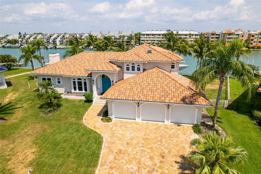Under contract-accepting backup offers. New listing in Tierra Verde! SELLER FINANCING AVAILABLE! A true, waterfront beauty! One of the few homes available in this area for the best price! Boasting over 100 feet of water frontage, only 5 minutes away from the Gulf of Mexico, this residence is a boater’s dream! A large private Boat Dock with a 16,000 lb. lift and an additional boat slip with 50 amp power, along with a newly repaired sea wall, new sod and irrigation, limestone floor, travertine pavers and a beautiful, heated saltwater pool creates a true outdoor oasis. 
Now coming inside this magnificent home you will be greeted with a stunning open floor plan, perfect for entertaining, which encompasses your living, dining, family area and kitchen. The impressive features in these spaces include custom marble on the wet bar, updated shaker cabinets and quartz counters, high end appliances and beautiful stone accents. The rest of the house offers 4 bedrooms, 3.5 bathrooms, a 3 car garage, and loft. Upstairs, you will find a master suite with gorgeous wood flooring and a view from the balcony which words cannot do justice. And it doesn’t just stop at looks! This home also comes with a brand new, 3 layer roof, valued near $100,000 and complete with a lifetime warranty, 4 AC units to include an air conditioned garage, all less than 7 years old (1 unit 2016, 2 units in 2018, and 1 in 2021) and ALL hurricane impact windows and doors! With fresh paint inside and out and all of the duct work replaced and cleaned out, this place feels like new! All of this, conveniently situated at the end of one of the most family friendly cul-de-sacs you can find! Swing by and schedule a showing to make this, one of a kind piece of Florida luxury your own! Home inspection report available upon request....