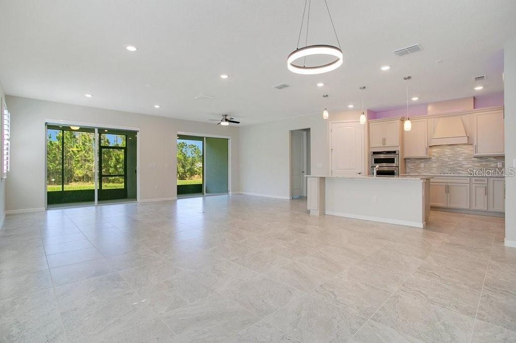 Photo of 2481 Southlawn Lane, Clermont, FL 34714 (MLS # S5133441)