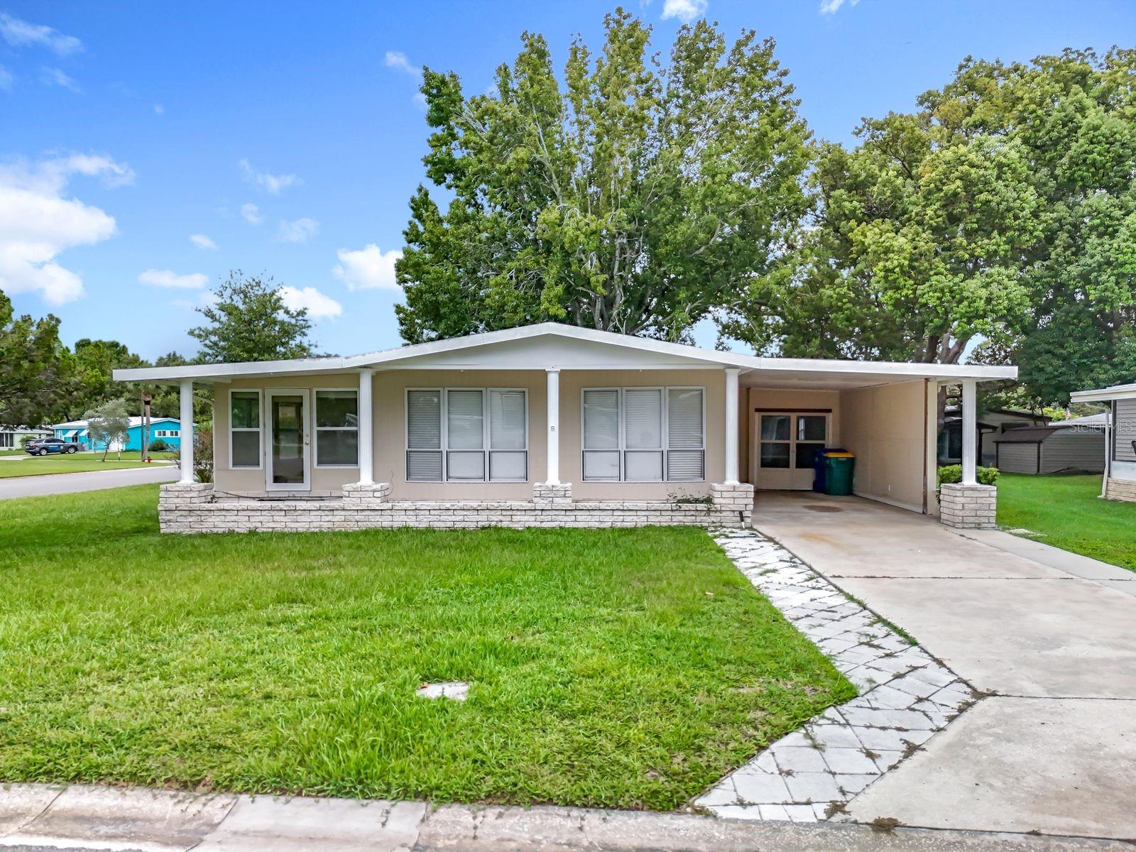 "Unbeatable opportunity! This spacious 2/2 home in 55+ community in Lake Frances offers the perfect blend of functionality and affordability. With ample storage throughout, you'll enjoy the convenience of not needing an extra storage unit. The expansive family room makes a stunning first impression. The carport/garage leads directly into the kitchen, making grocery unloading a breeze. From there, the large dining room is perfect for hosting gatherings. The primary bathroom boasts a newly upgraded shower area and additional storage accessible from both the bathroom and laundry room. Recent maintenance includes AC upkeep, and the roof was recoated in 2022. This golf cart community offers endless entertainment options, including 2 swimming pools, a pool room, library, and weekly breakfast meetings. Enjoy year-round celebrations and take advantage of downtown dining without parking worries. Schedule a showing today and experience the magic of Lake Frances, including breathtaking sunsets at one of the waterfront restaurants."