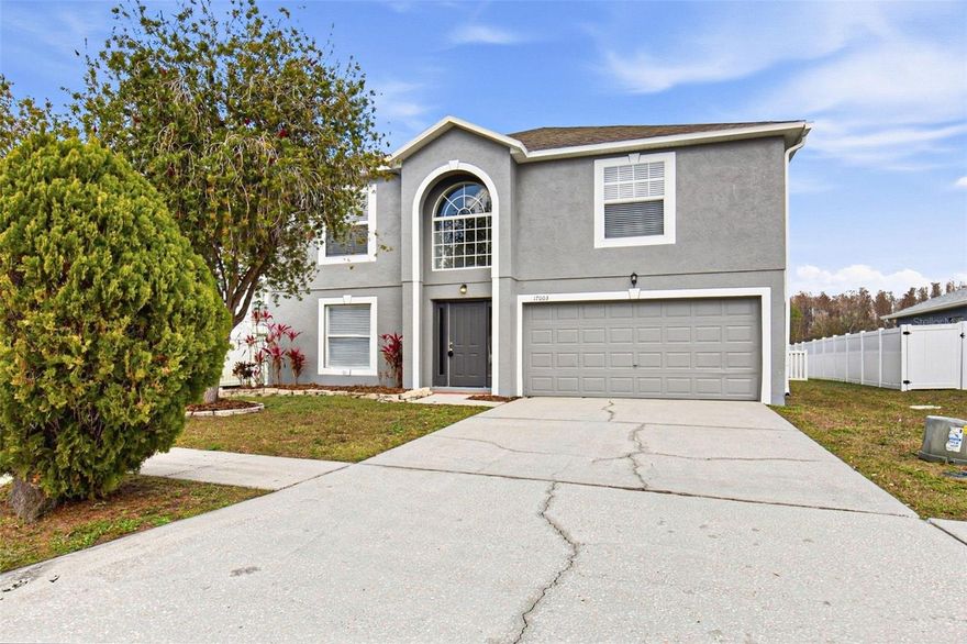 Welcome to this spacious 4-bedroom, 3.5-bath home located in the Suncoast Pointe Villages community of Land O’ Lakes. Offering over 3,000 square feet of living space, this two-story residence features a functional layout with generous room sizes and multiple living and dining areas ideal for everyday living and entertaining. The kitchen includes a center island, built-in desk area, closet pantry, and walk-in pantry, flowing seamlessly into the main living spaces. The primary suite offers ample space along with a private bath featuring a garden tub and shower. Secondary bedrooms are comfortably sized, and the home’s thoughtful design provides flexibility for a variety of lifestyle needs. Situated on a corner lot within a cul-de-sac and near a conservation area, the property offers added privacy and outdoor space, along with a two-car garage and convenient access to major roadways, shopping, and dining.