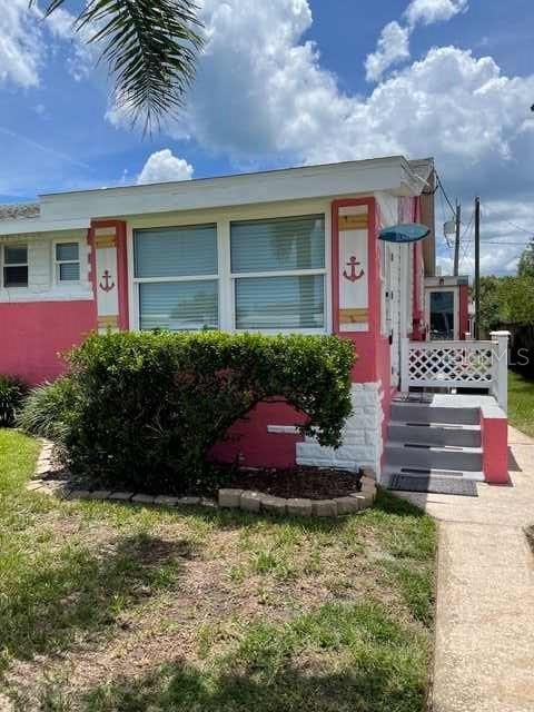 Photo of 833 E 24th Avenue #106, New Smyrna Beach, FL 32169 (MLS # O6398203)