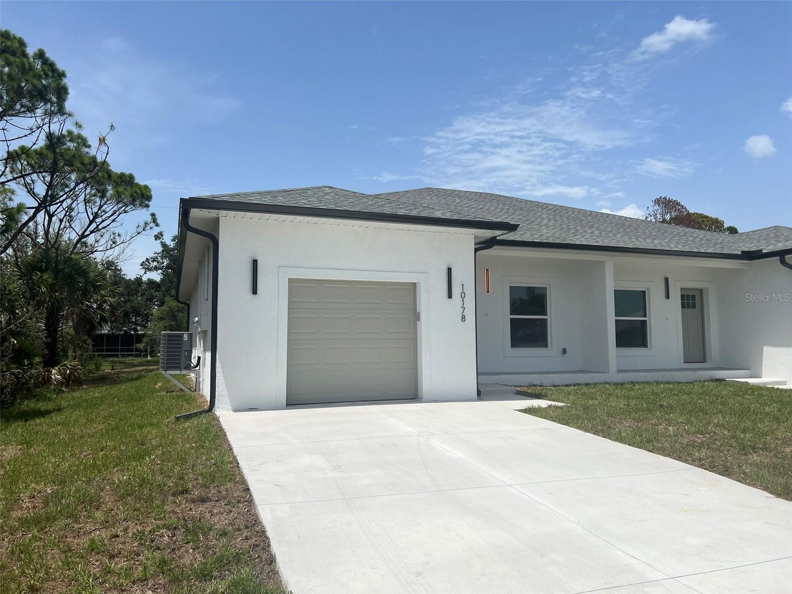 **ANNUAL** BEAUTIFUL 3/2/1 AVAILABLE NOW** This GORGEOUS duplex is located in the sought after Englewood area on a quiet street, near the BEACHES!!! Kitchen has stainless steel appliances and bar area for seating. Home has indoor utility room with washer/dryer, wood tile flooring, and modern fixtures throughout!! Call for showing appointment TODAY!