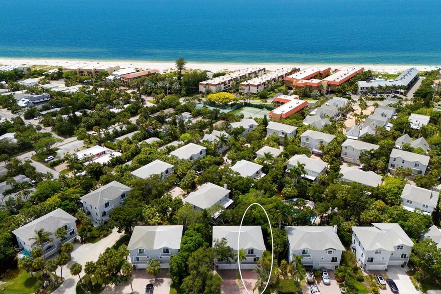 INCOME PRODUCER OR FULL-TIME RETREAT, TURNKEY!
Experience elevated island living just steps—less than two blocks—from Anna Maria Island’s world-famous sugary sand Gulf shoreline.
This rare opportunity in coveted North Beach Village features a beautifully updated 3-bedroom, 2.5-bath townhome offering effortless coastal luxury and exceptional rental potential. The ground floor welcomes you with a spacious two-car garage featuring epoxy flooring, abundant storage, and a versatile flex area perfect for beach gear, bikes, or a recreation space. Upstairs, the bright open-concept living level impresses with a modern chef’s kitchen complete with 42-inch shaker cabinetry, stainless steel appliances, Skye Cambria quartz counters, custom backsplash, and bar seating for effortless entertaining. Two oversized sliding glass doors flood the home with natural light and open to a private Trex-deck patio, ideal for morning coffee or sunset cocktails. This level also includes a stylish powder room, dedicated dining area with its own cozy patio, and a custom-designed laundry room for added convenience. The top floor is your private sanctuary: the serene primary suite boasts a brand-new California Closet system, a reimagined spa-inspired bathroom, and its own private balcony. Two additional guest bedrooms include custom closets—one enhanced with a Murphy bed, built-in desk, and shelving for maximum flexibility. Outdoor living shines with a ground-level patio complete with Trex decking, a grill station, sink, and outdoor shower—perfect after a day at the beach. Additional highlights include hurricane-impact windows and doors throughout, reinforced garage door, custom cabinetry throughout, Trex decking throughout, LED lighting, tankless water heater, new roof, new HVAC, plus a bonus room with built in split unit and oversized storage closet on the main floor. Residents enjoy a newly refinished heated community pool, and weekly rentals are permitted—making this property an amazing income-producing investment or an ideal personal getaway. No assessments make it even better. For boat lovers, there are two boat slip basin rentals ranging from $425-$600 annually through the City of Holmes Beach located at Sunrise Basin and T-ends. Two minutes away you will find public pickleball, tennis and basketball courts. Here, you’re not just purchasing a home—you’re stepping into the sought-after North Beach Village lifestyle, with pristine beaches, charming boutiques, and Anna Maria Island’s vibrant dining scene right at your fingertips.