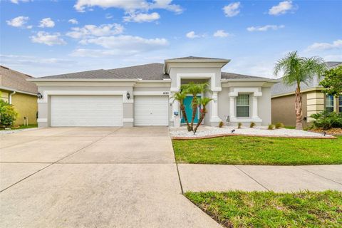 Photo of 6843 Boulder Run Loop, Wesley Chapel, FL 33545 (MLS # TB8438803)