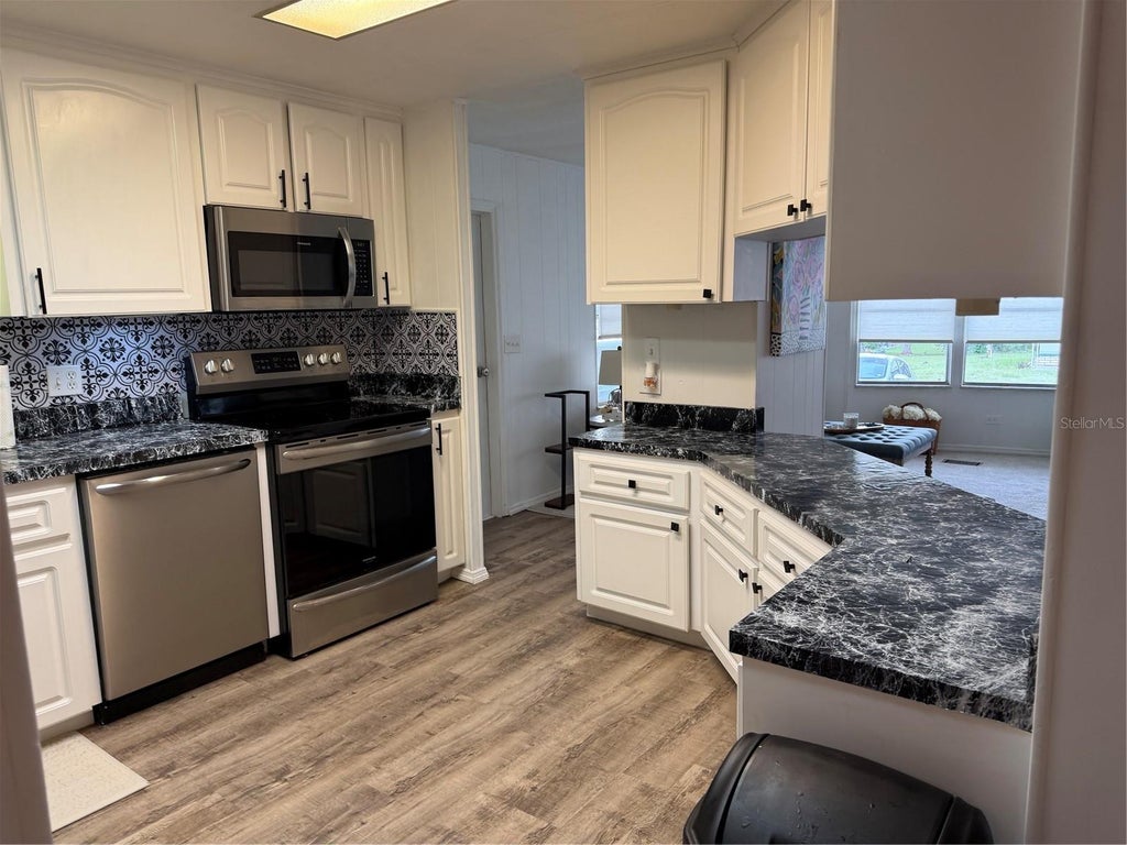 Photo of 12260 Hallmark Avenue, Brooksville, FL 34613 (MLS # W7887582)