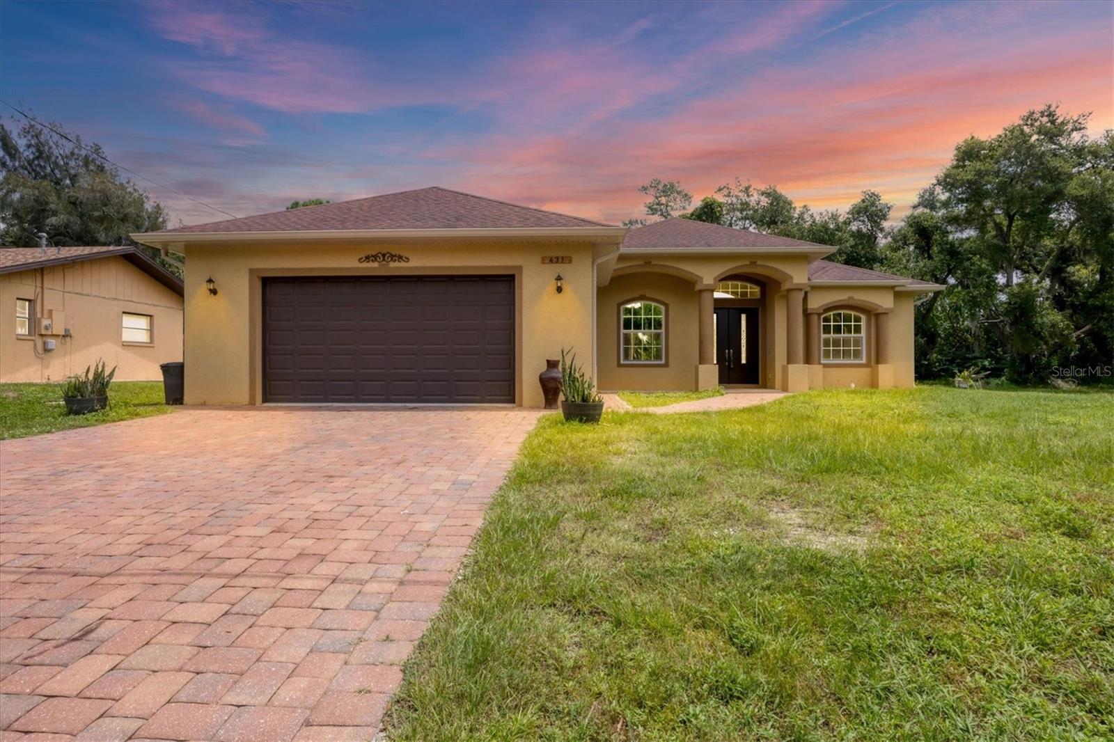 Welcome to a great opportunity to own the home of your dreams built in 2018 in the desirable city of North Port, Florida.No one will live behind your house. The house also has a clear lot of land on its right-hand side, making the total purchase price 500,000 (an additional $40,000 MLS #0770030031), a 9,600-square-foot lot. The house is beautifully molded as an open floor plan with high ceilings. It is a one-of-a-kind house in a very peaceful neighborhood, minutes away from Warm Mineral Springs and all major shopping centers the house is a short 15-minute drive from the beach. Situated in a vibrant and thriving community , this property promises a lifestyle filled with abundant sunshine, natural beauty, and coastal charm. HIGH CEILINGS! NOT FLOOD ZONE! NO HOA OR CDD!GREAT ELEVATION! Nestled in the heart of North Port, this home benefits from its prime location, offering easy access to an array of amenities and attractions. Discover the nearby pristine Gulf beaches, where you can bask in the sun, partake in water activities, or simply relish the tranquility of the ocean. Embark on nautical adventures from the conveniently located marinas, allowing you to explore the region's captivating waterways and nearby islands. Fishing enthusiasts will delight in the world-class fishing opportunities, while golf aficionados can indulge in a variety of renowned golf courses. North Port is known for its thriving shopping and dining scene, featuring a diverse range of retail centers, boutiques, and restaurants. Immerse yourself in the vibrant downtown area, boasting charming shops, art galleries, and entertainment venues. The city hosts numerous cultural events, festivals, and community gatherings throughout the year, ensuring there's always something exciting happening. Beyond the city's amenities, this vacant lot offers proximity to breathtaking nature parks and preserves. Lose yourself in the beauty of Charlotte Harbor Preserve State Park, where scenic trails, wildlife sightings, and peaceful waterways await exploration. Myakka River State Park is another nearby gem, enchanting visitors with its stunning landscapes and diverse flora and fauna. Nature enthusiasts will find endless opportunities to connect with the outdoors just moments away from this property. North Port also boasts excellent educational institutions, reliable medical facilities, and convenient transportation options. The city's welcoming community and strong sense of belonging make it an ideal place to establish roots and create lasting memories. Do not miss out on this exceptional opportunity to craft your dream home or invest in a prime location. Schedule a showing today and begin envisioning the endless possibilities offered by this remarkable property! Experience the best that Florida living , with nearby beaches, golf courses, and outdoor recreational activities just a short drive away. Don't miss out on the chance to own this extraordinary home.