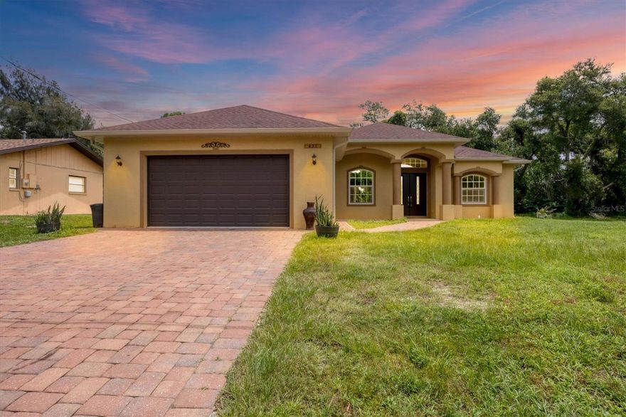 Welcome to a great opportunity to own the home of your dreams built in 2018 in the desirable city of North Port, Florida.No one will live behind your house. The house also has a clear lot of land on its right-hand side, making the total purchase price 500,000 (an additional $40,000 MLS #0770030031), a 9,600-square-foot lot. The house is beautifully molded as an open floor plan with high ceilings. It is a one-of-a-kind house in a very peaceful neighborhood, minutes away from Warm Mineral Springs and all major shopping centers the house is a short 15-minute drive from the beach. Situated in a vibrant and thriving community , this property promises a lifestyle filled with abundant sunshine, natural beauty, and coastal charm. HIGH CEILINGS! NOT FLOOD ZONE! NO HOA OR CDD!GREAT ELEVATION! Nestled in the heart of North Port, this home benefits from its prime location, offering easy access to an array of amenities and attractions. Discover the nearby pristine Gulf beaches, where you can bask in the sun, partake in water activities, or simply relish the tranquility of the ocean. Embark on nautical adventures from the conveniently located marinas, allowing you to explore the region's captivating waterways and nearby islands. Fishing enthusiasts will delight in the world-class fishing opportunities, while golf aficionados can indulge in a variety of renowned golf courses. North Port is known for its thriving shopping and dining scene, featuring a diverse range of retail centers, boutiques, and restaurants. Immerse yourself in the vibrant downtown area, boasting charming shops, art galleries, and entertainment venues. The city hosts numerous cultural events, festivals, and community gatherings throughout the year, ensuring there's always something exciting happening. Beyond the city's amenities, this vacant lot offers proximity to breathtaking nature parks and preserves. Lose yourself in the beauty of Charlotte Harbor Preserve State Park, where scenic trails, wildlife sightings, and peaceful waterways await exploration. Myakka River State Park is another nearby gem, enchanting visitors with its stunning landscapes and diverse flora and fauna. Nature enthusiasts will find endless opportunities to connect with the outdoors just moments away from this property. North Port also boasts excellent educational institutions, reliable medical facilities, and convenient transportation options. The city's welcoming community and strong sense of belonging make it an ideal place to establish roots and create lasting memories. Do not miss out on this exceptional opportunity to craft your dream home or invest in a prime location. Schedule a showing today and begin envisioning the endless possibilities offered by this remarkable property! Experience the best that Florida living , with nearby beaches, golf courses, and outdoor recreational activities just a short drive away. Don't miss out on the chance to own this extraordinary home.