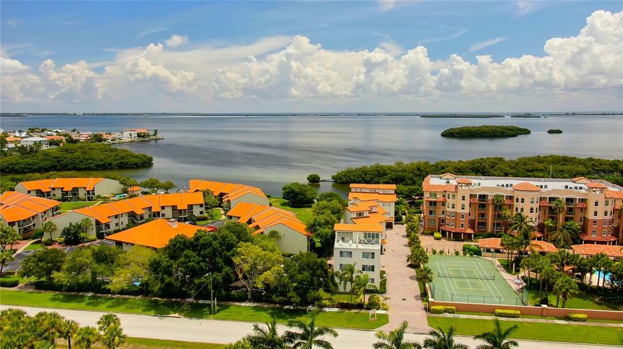 TROPICAL PARADISE Awaits you on the "ISLAND OF TIERRA VERDE"! Desirable Community of Tierra Del Mar! SPACIOUS TOWNHOME with 2,100 Heated Square Feet of Living! 3 Bedrooms PLUS Office or Bonus Room, 3.5 Bathrooms with 1 Car Garage and AMAZING ROOF TOP LANAI Overlooks a Western View with SPECTACULAR SUNSETS! ENJOY A GULF BREEZE over Boca Ciega Bay! Spot Dolphins, Manatees and Osprey! Light, Bright and Beautiful! DOWNSTAIRS PRIVATE "EN SUITE" Bedroom for your Guests or In Laws! Great Room Floor plan Features Beautiful Real Hardwood Flooring as well as in Dining Room, Kitchen and Stairs! Owners Retreat has Walk in Closet! and Bathroom Features Double Sinks and Walk In Shower! Marble Flooring and Countertops! Inside Laundry Closet with WASHER AND DRYER INCLUDED! Ceiling Fans Throughout! Neutral Decor! Plenty of Storage! 2 Air Conditioners! Security System! Pavered Driveway! PEACEFUL COMMUNITY of 8 Townhomes Featuring FABULOUS RESORT STYLE POOL Shared with Hidden Lagoon Community Next Door to the South. This WATERFRONT COMPLEX Offers Some of the BEST FISHING in the County! KAYAKING and PADDLE BOARDING! Boat Slips may be Available from Other Owners to Lease. RIDE YOUR BIKE to Historic Fort Desoto Park, One of the #1 Beaches in the U.S.! Just 5 Miles to the Sugar Sands at ST. PETE BEACH! Close to Nearby Restaurants and Shopping! Great Location! World Renowned "Don Cesar" Hotel nearby! Easy access to Tampa International Airport! Fully Furnished or Unfurnished if Desired. CLEAN AND COMFORTABLE! Includes: Ground Maintenance, Community Pool and Trash. Must See Inside to Appreciate! You Will Want to Stay Forever and Call it your Home! LANDLORD MAY CONSIDER RENTING PROPERTY UNFURNISHED! LANDLORD MAY CONSIDER A PET! OPTIONAL SEASONAL RENTAL!