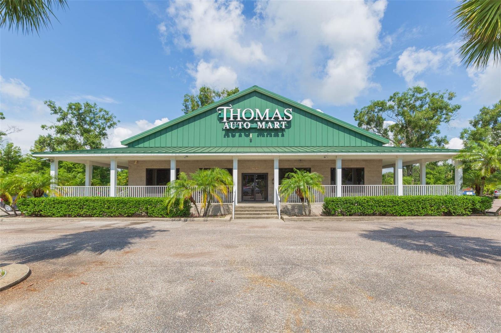 Rare exclusive offering of a legacy owned turn key automotive dealership. Excellent exposure on a busy main thoroughfare (CR52) with a average daily FDOT traffic count of 10,800 cars. Main building features textured block construction and low maintenance metal roof. Main building floor plan includes 4 private offices, conference room, lobby with reception counter, 2 restrooms (1 with shower), kitchen/break room, utility/communication room, a 120' wrap around porch canopy, and a large attic storage room. Additional buildings include a stand alone 528 sqft office with 240 sqft porch plus a 3400 sqft detached garage which includes a 20'x25' secure storeroom. Nearly all of the 2.9 ACRES is paved with asphalt or concrete and includes space for 125 regulation parking spaces or retail display space for 200+ automobiles. Sale also includes a 14'x34' RV port and a 32'x55' 7 car carport. Entire property is fenced with 6' vinyl coated chain link fencing. Signage includes a large marquis sign with digital display. Property has mature landscaping including decorative palm trees and lighting. Surrounding area has multiple recently completed and under construction residential developments and is experiencing considerable growth. Current "CG" zoning is General Commercial. It's a zoning district that allows a variety of retail and commercial service activities that are compatible with surrounding uses and residential areas. Specifically, in Dade City, the CG, CBD, and CH zoning districts are restricted to properties abutting State Road 52, U.S. 98 Bypass, and U.S. Hwy 301.