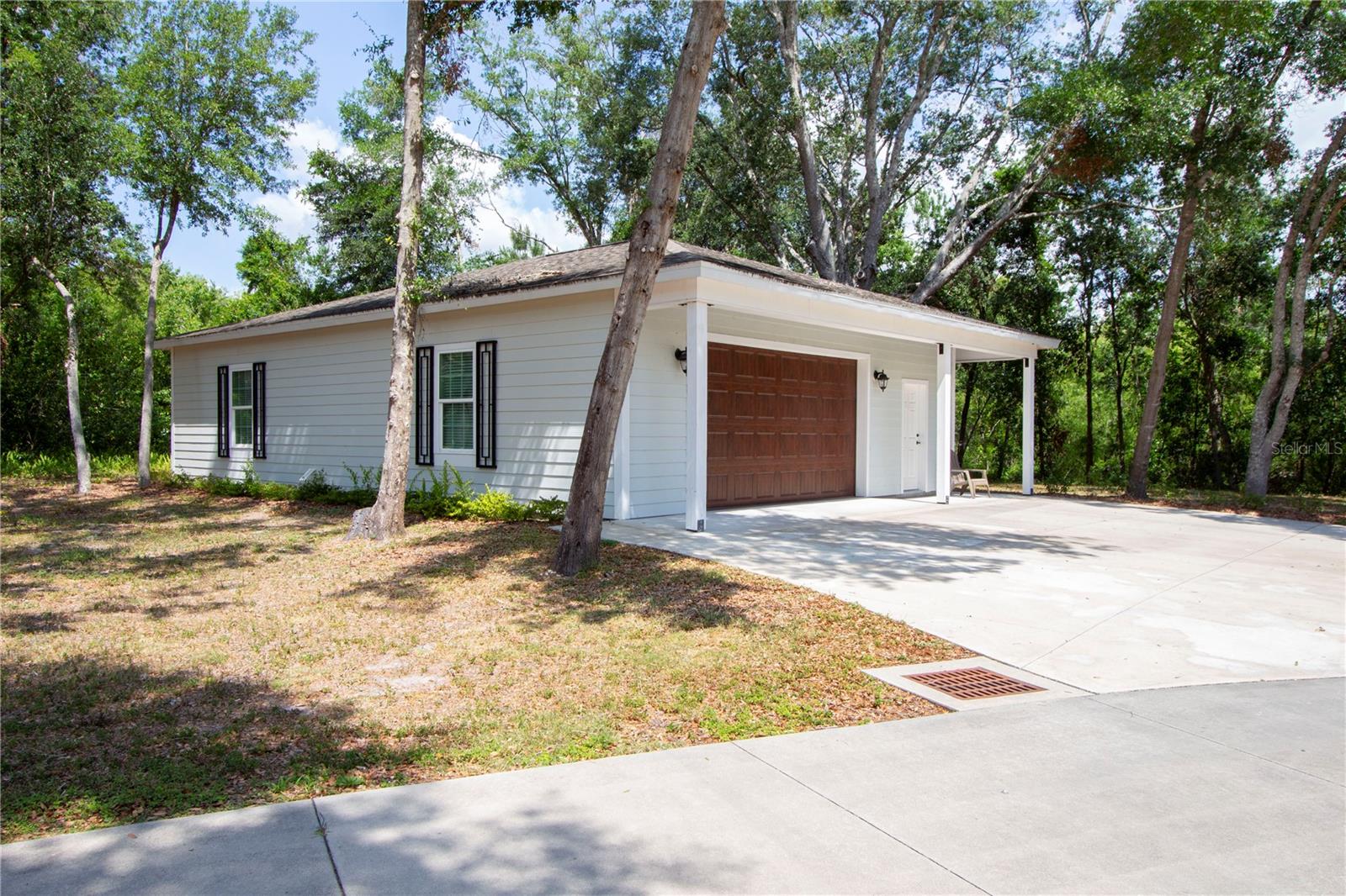 A major highlight of this rental is that all utilities are included—electric, water, and trash—making budgeting simple and stress-free. This stunning 1 bedroom, 1 bathroom home has been thoughtfully remodeled with attention to every detail, offering a perfect blend of comfort and convenience. Located in the heart of Lutz, you'll enjoy quick access to major highways, grocery stores, and all that makes Tampa special. Additional features include: Private entrance for added privacy. Enclosed screened-in porch – perfect for relaxing Garage access with a workstation, and in-unit laundry. Modern updates throughout with a clean, comfortable layout. This home is ideal for anyone looking for low-maintenance living in a peaceful setting, while staying close to city conveniences. Don’t miss out on this rare opportunity—schedule your tour today! **NO Parking vehicles inside garage.