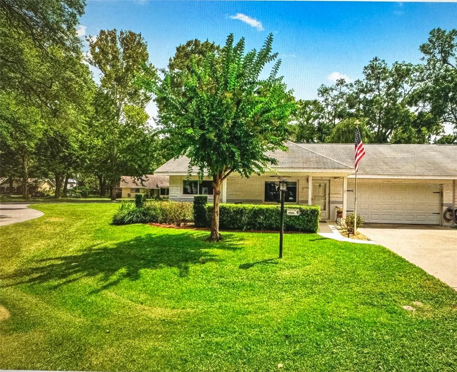 One or more photo(s) has been virtually staged. SPACIOUS MONTGOMERY CORNER UNIT! FURNISHED! TURN-KEY! GOLF CAR INCLUDED! This inviting 2-bedroom, 2-bathroom, 2 car garage unit sits on a desirable corner lot along a picturesque tree-lined street, offering charm and curb appeal. At the heart of the home, the kitchen features new tile flooring, recessed lighting, a pantry, a spacious island, perfect for everyday living and entertaining. 2 solar tubes help brighten the interior with abundant natural light. The primary suite provides a generous retreat with a walk-in closet and a beautifully updated bathroom showcasing oversized walk-in shower including built in seat, decorative grab bar, and glass enclosure. A true highlight is the additional bonus room, offering extra living space that can be used as a home office, hobby room, or relaxing family room, complemented by an additional screened lanai to enjoy the outdoors. With its prime location and spacious layout and 2 car garage includes a new garage door as well, this home delivers comfort, convenience, and curb appeal all in one. Located in On Top of the World, Ocala’s premier gated 55+ community. Residents enjoy world-class amenities and golf cart access to nearby shopping, dining, and medical facilities. Plus, you’ll be just a short drive from the renowned World Equestrian Center. Schedule your private tour today—please note, verbal offers will not be accepted.