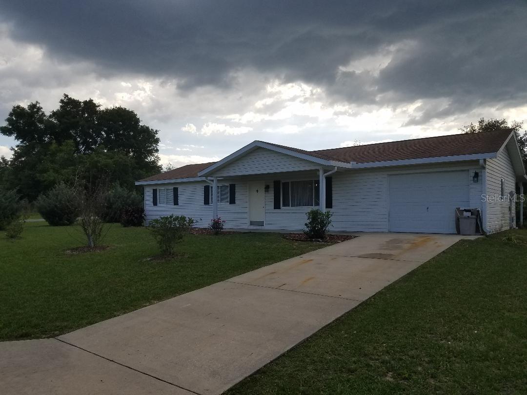Location ...location Nice home 2/2/1 with newer flooring and paint feature large corner lot,private lanai ,living area,dining area and master bedroom with walk in closet. Great location, minutes to shopping,Hwy 200,restaurants ,medical facility's and I-75