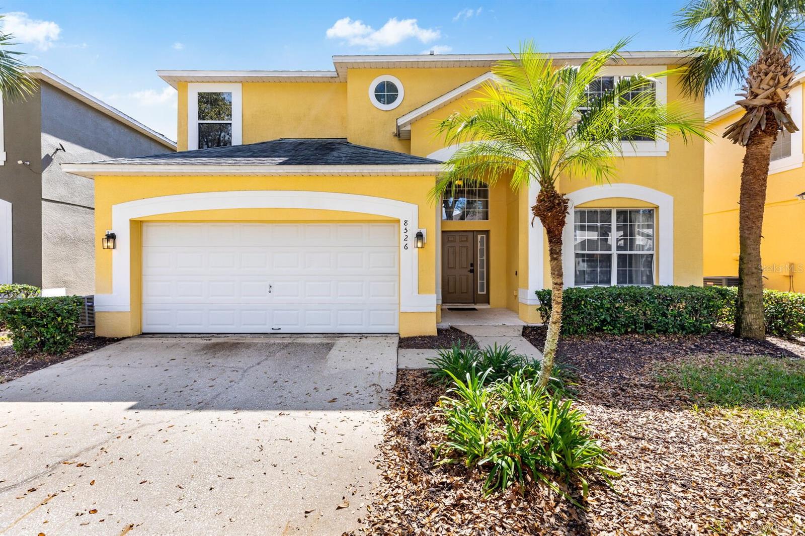 Wow, what a home. This property can be used as a residential home or a short term rental Disney rental property. South facing pool. Just put the key in the door and enjoy. This 7 bedroom 4.5 bath pool & spa home comes with two primary bedrooms. One on the main floor and another on the second floor. Granite counter tops in the kitchen and all the bathrooms and a furniture package that will make all your family and Disney guest smile. With TV's throughout the home and a game room in the garage, you may never leave the home. New water heater in 2025, New floors upstairs 2025, Roof was replaced in October 2017,one of the AC unites was replaced in 2018 and the other one in April 2024, stand up video game was placed in the game room in 2019, new game table 2022, new dish washer and microwave 2022, new hot tub 2022, New pool pump and resurfaced the swimming pool 2023, new dining room table and sofa in living room 2022. Emerald Island is located in the exclusive Emerald Island Resort, which is within a 7 minute drive of Disney World, Animal Kingdom, Typhoon Lagoon and Blizzard Beach. Only about one mile away is a grocery store and multiple restaurants for your dining enjoyment. A Target and Wal-Mart are 2 miles away. For the sports enthusiasts, there are several highly regarded golf courses within a very short drive. In addition to the Disney World attractions such as Sea World, Universal Studios, Islands of Adventure and Aquatica are easily accessible via the I-4 junction which is just minutes away from the house. Kennedy Space Center is an hours drive away on the Atlantic Coast along with famous beaches such as Cocoa Beach. Busch Gardens in Tampa is an hours drive towards the Gulf Coast. Contact your agent today to set up a viewing of the home. Please view the virtual button for a photo page of this home.