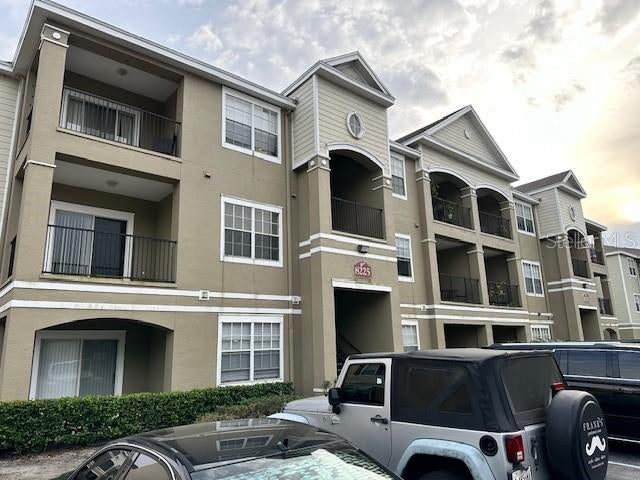 Photo of 8225 Claire Ann Dr #203, Orlando, FL 32825 (MLS # S5152179)